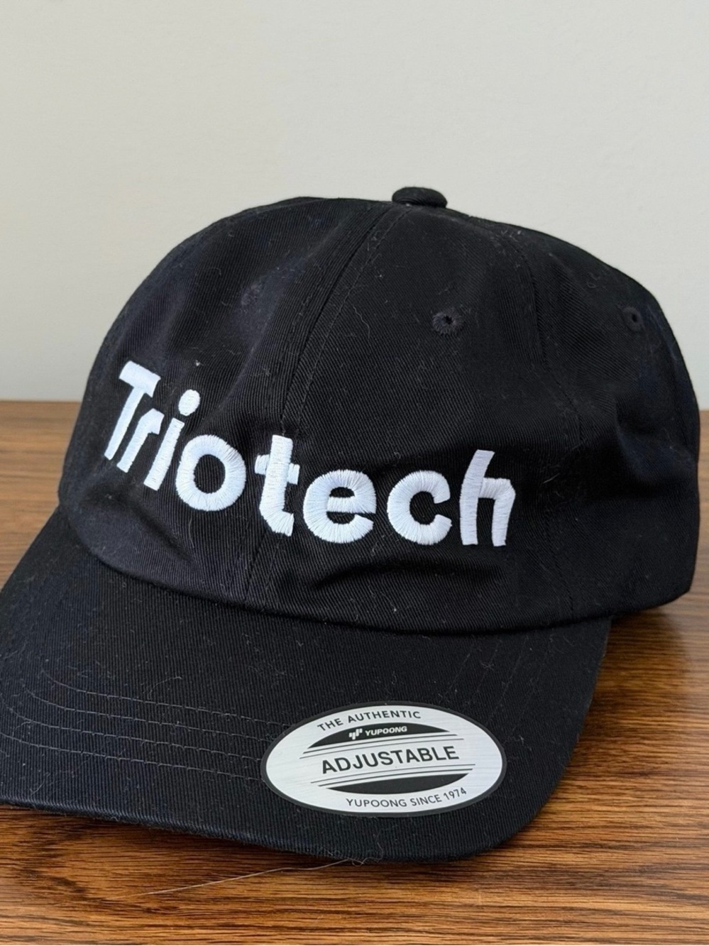 Triotech Amusement Attractions Yupoong Embroidered Strapback Dad Hat Black